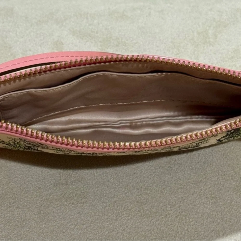 COACH Limited Edition Floral Canvas Wristlet Leather Trim and Bow Charm
